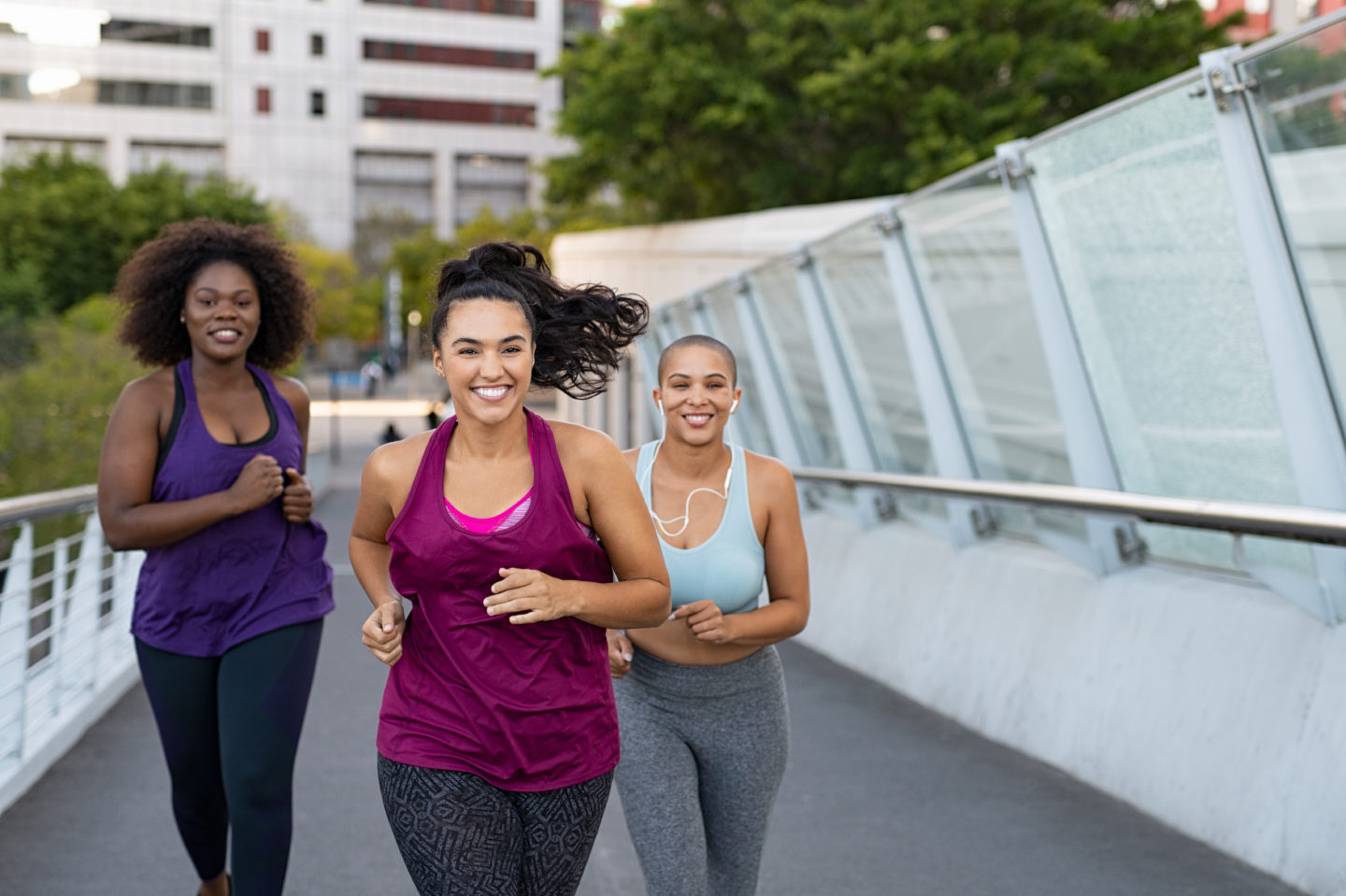 Happy women exercising together